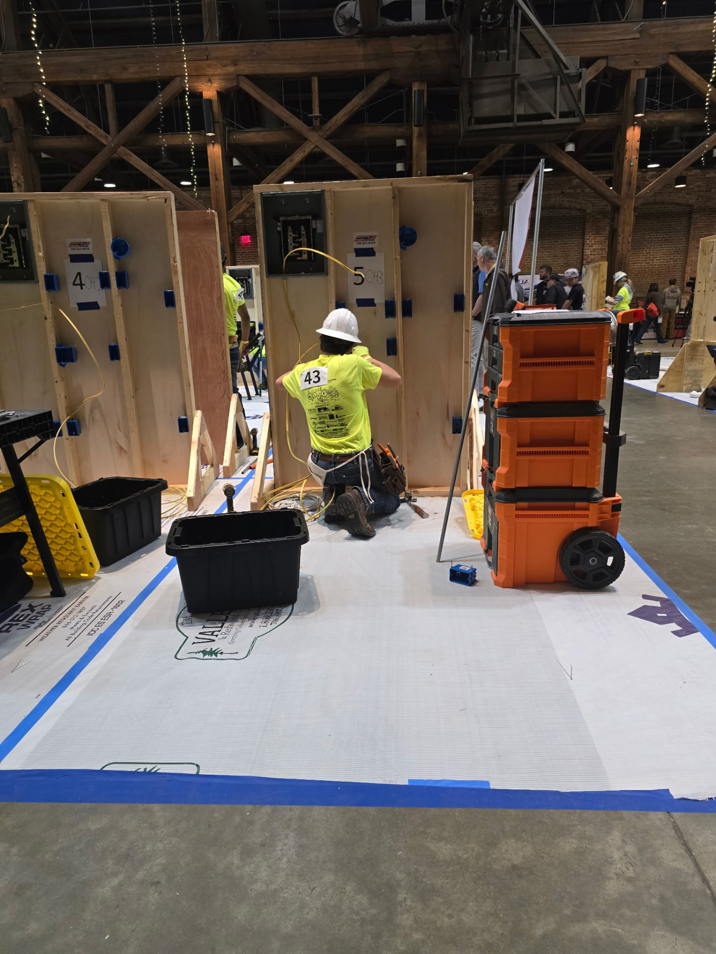 Hayden wiring an electrical panel during competition