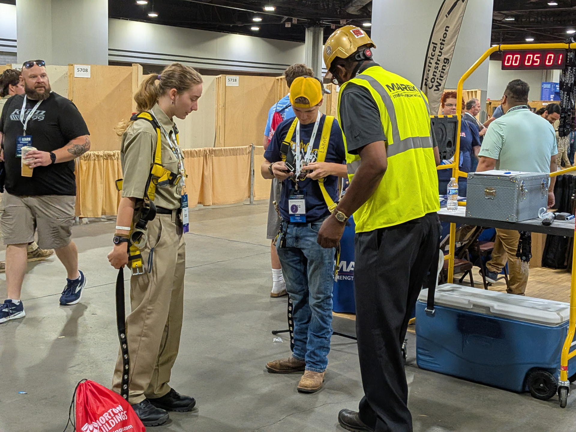 Industry vendor demonstrating equipment to attendees at the SkillsUSA national conference