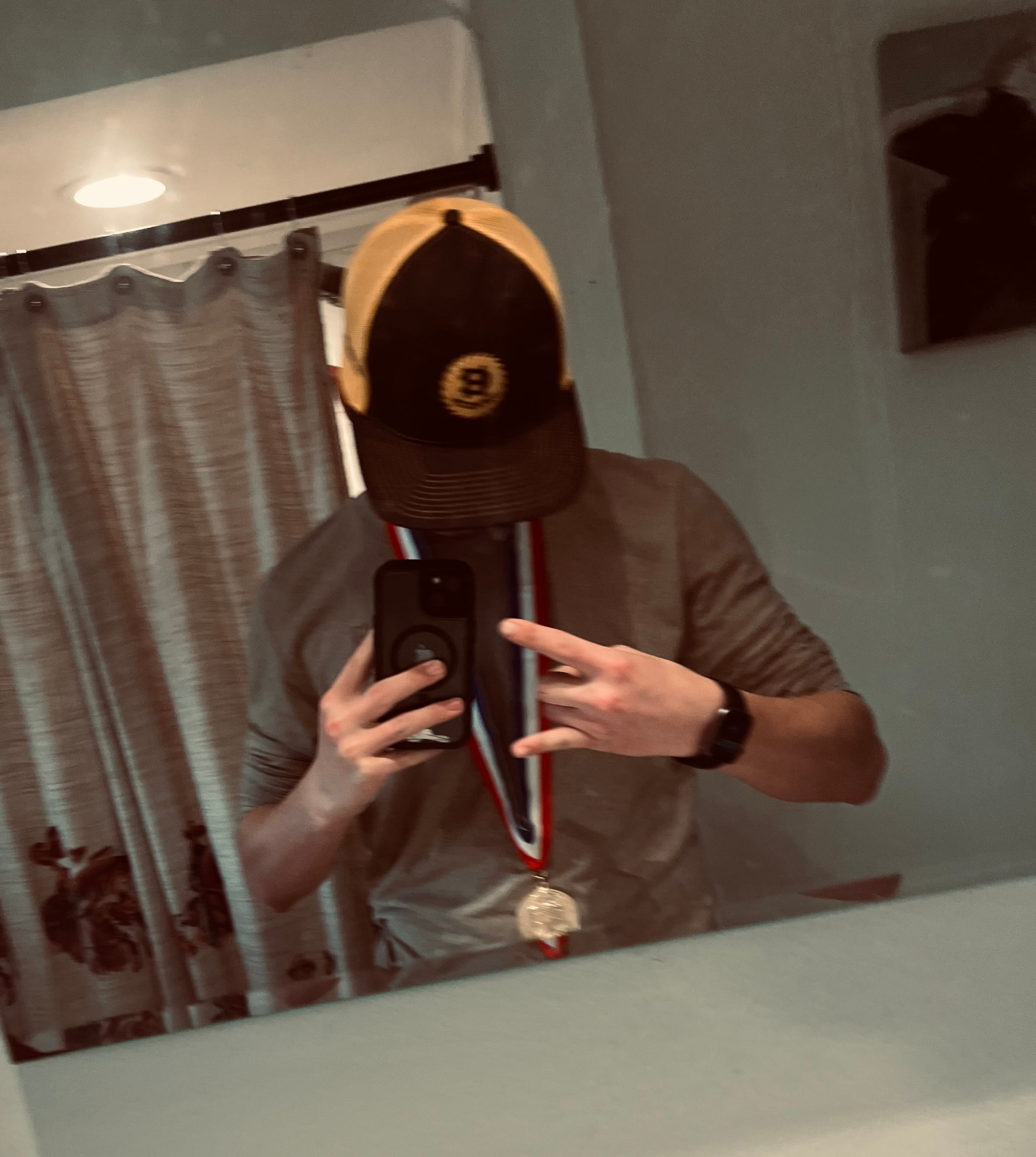 Hayden wearing his SkillsUSA gold medal after the state awards ceremony