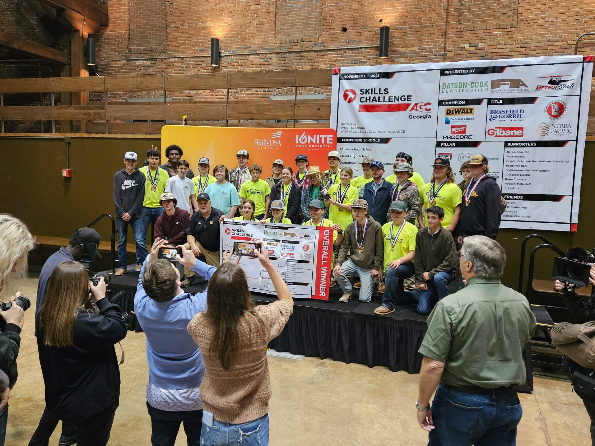 Awards stage at the AGC Georgia Skills Challenge with the overall winner banner