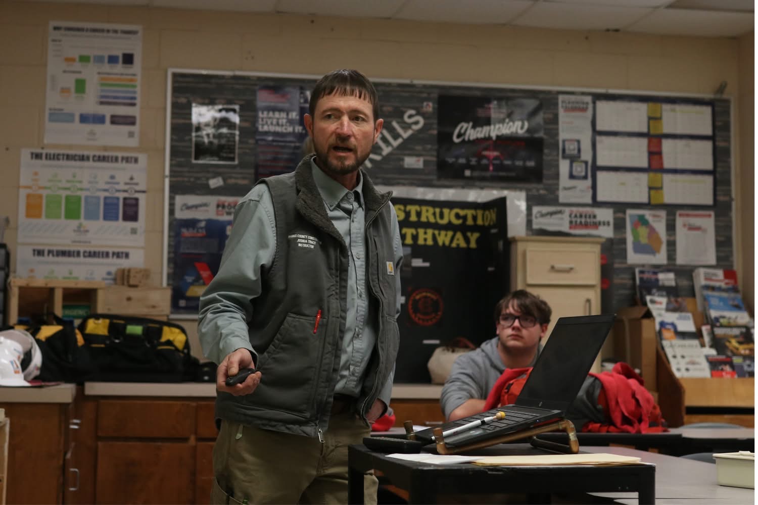 Instructor teaching construction students in a classroom