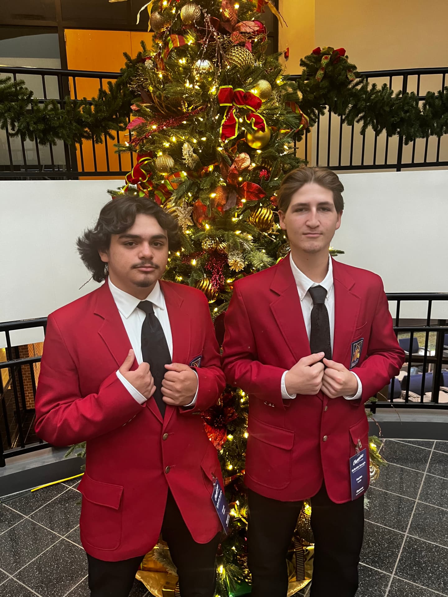 Hayden and a fellow member in SkillsUSA red blazers at a leadership conference